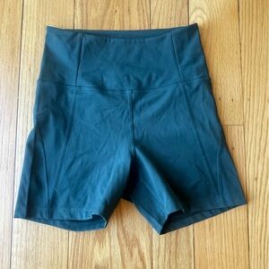 Girlfriend Collective bike shorts. Forest Green. Size small.